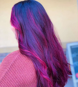 Vibrant magenta and blue dimensional hair color