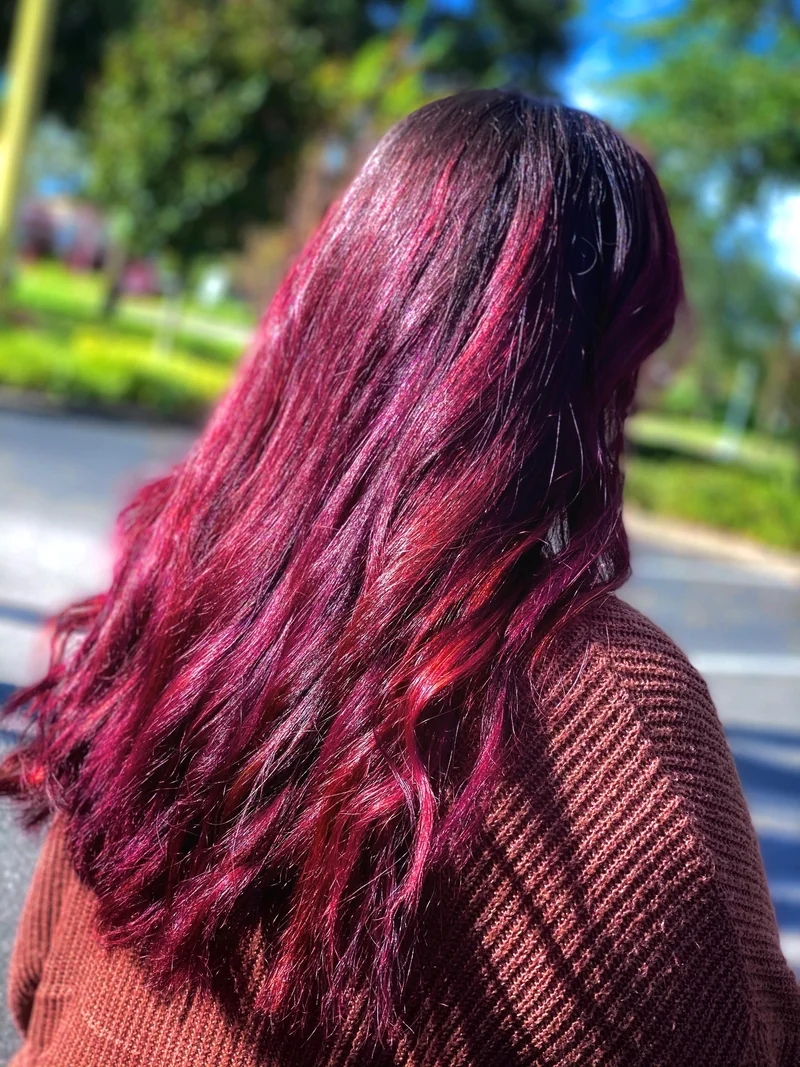 Glossy berry-colored waves photographed in daylight.