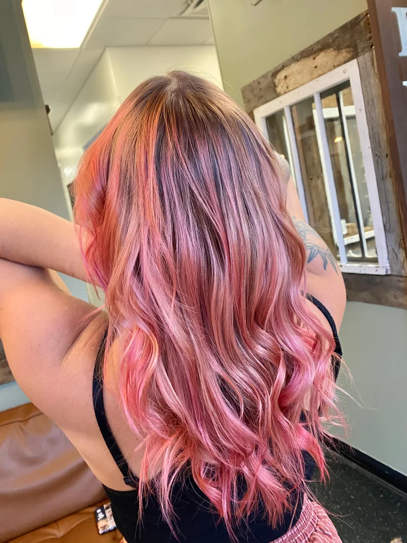 Rose-pink and peach waves with deeper roots.