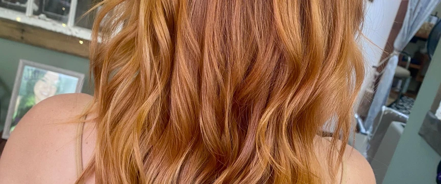 Luminous copper salon color with soft styled movement