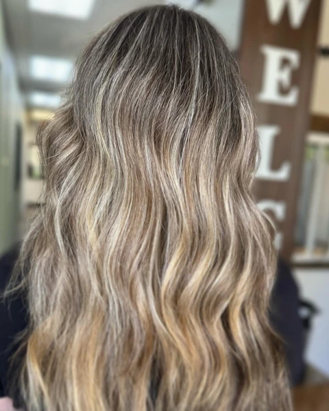 Dimensional blonde result with soft ribbons from crown through ends