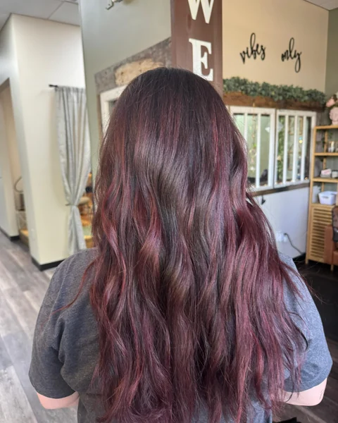 Burgundy dimensional color with glossy movement from crown through ends