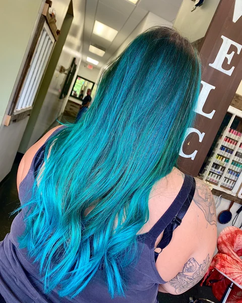 Teal creative color transformation with even saturation from crown through ends