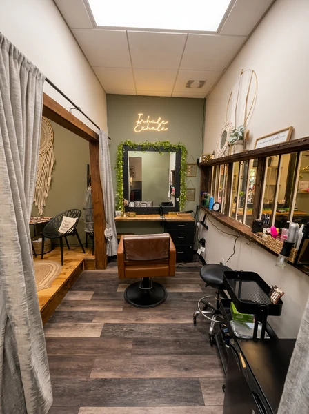 Warm interior and styling stations at Good Vibes Salon