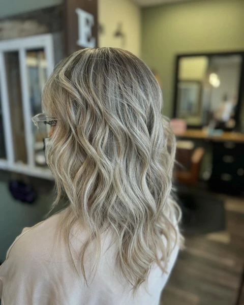Cool blonde event waves photographed from partial profile