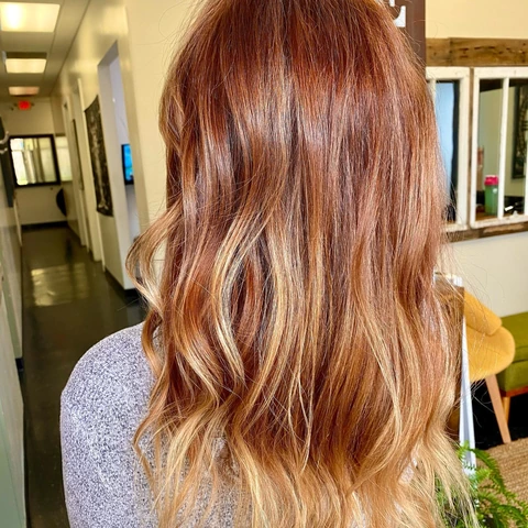 Dimensional copper hair result photographed from the back