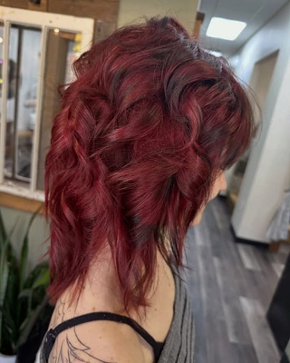 Textured ruby red bob with visible shape and movement