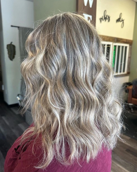 Textured silver lob with visible shape photographed from the back