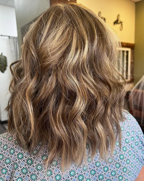 Soft brunette lob photographed from the back